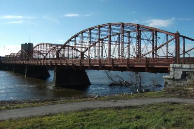 Thumbnail of StoryMap analyzing bridge capacity featuring rusty 5-arch bridge